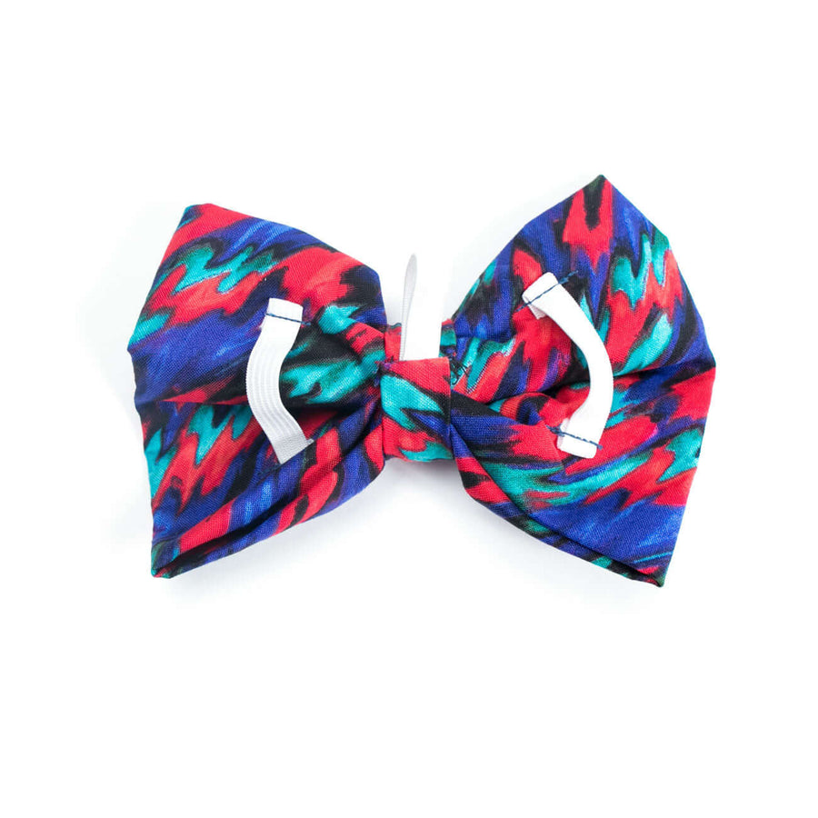 Colorful Blue Razz Bowtie designed for dogs, easily slips onto collars for special occasions and daily wear.