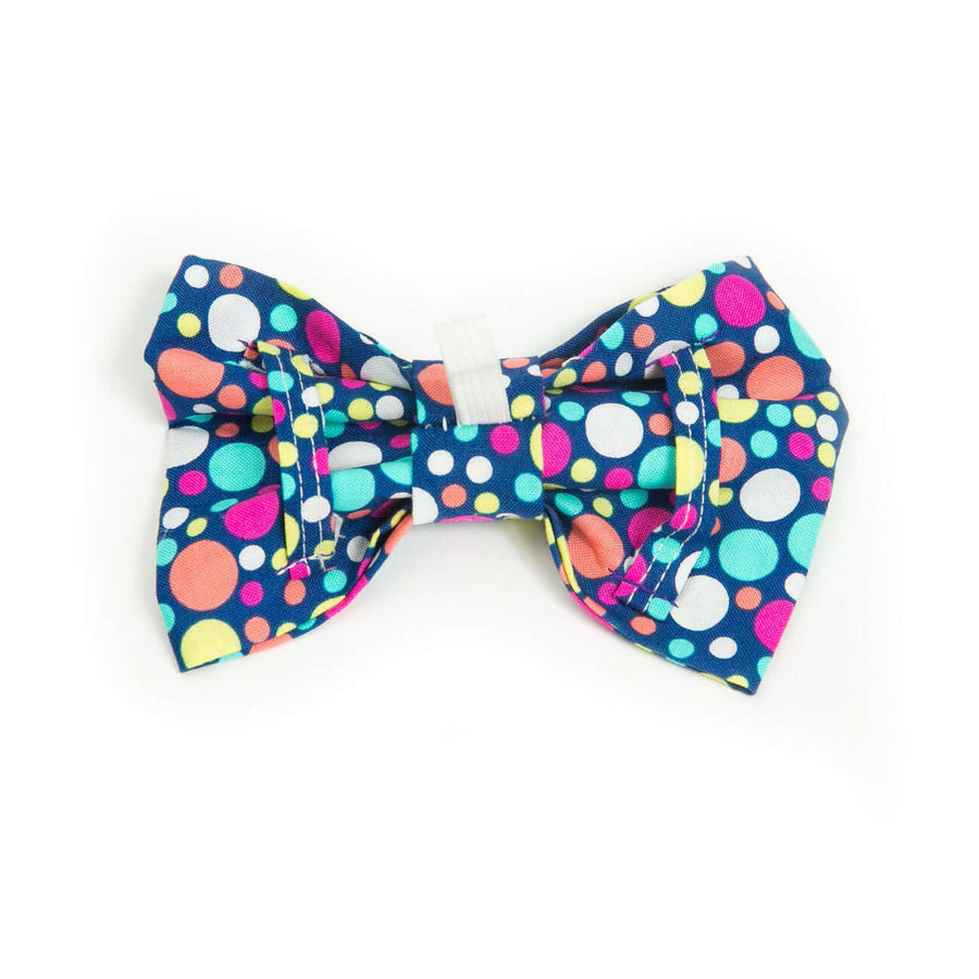 Bubble Pop Bowtie featuring colorful polka dots, designed to easily attach to dog collars for special occasions.