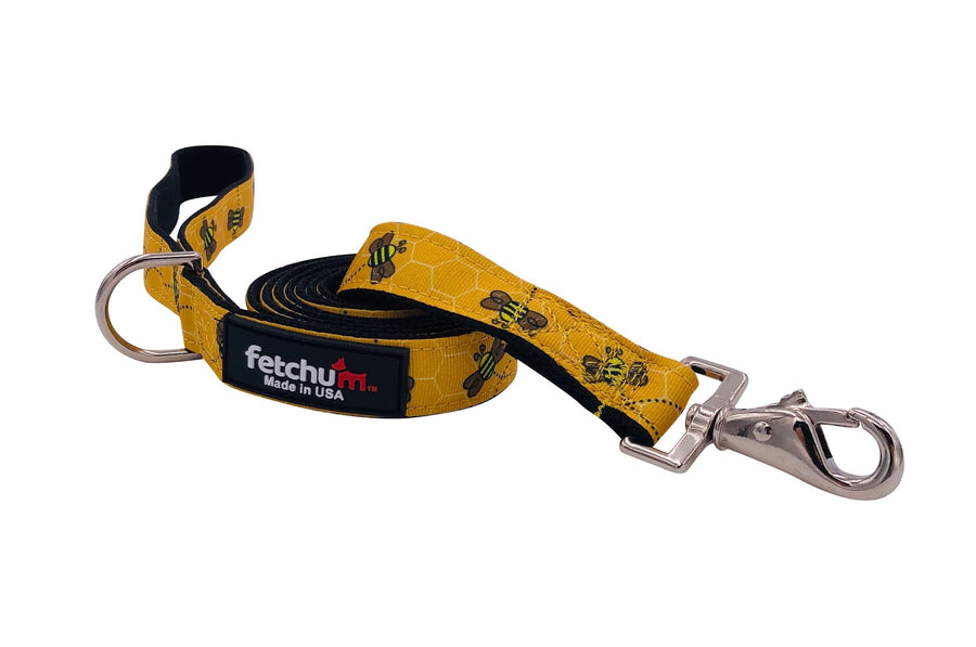 BUMBLE BEE LEASH in yellow with bee print, featuring a stylish snap and comfortable grip, ideal for walks.