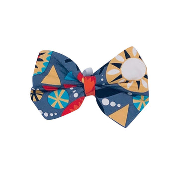 Pop Bow tie featuring a colorful geometric pattern, perfect for special occasions and everyday wear for dogs.