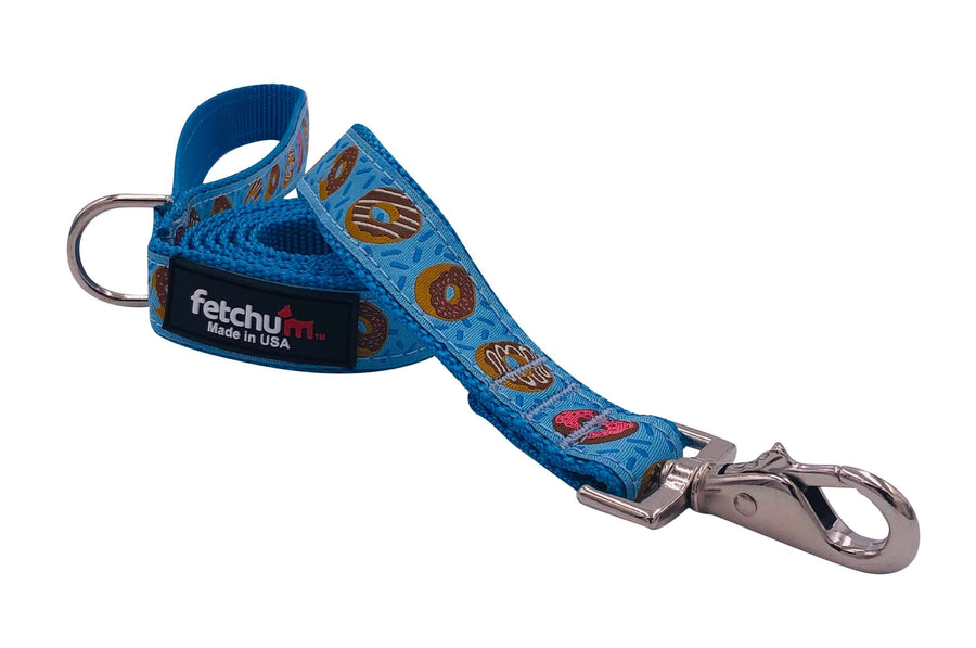 DONUT LEASH featuring a blue design with donut patterns, made from durable materials and equipped with a stylish swivel snap.