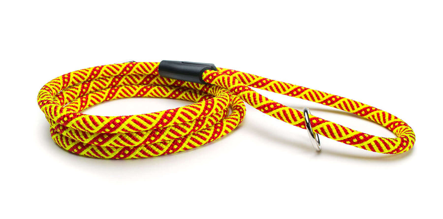 Fetchum Leash In Tribal Sunset featuring bright yellow and red climbing rope with marine clip for secure dog walking.