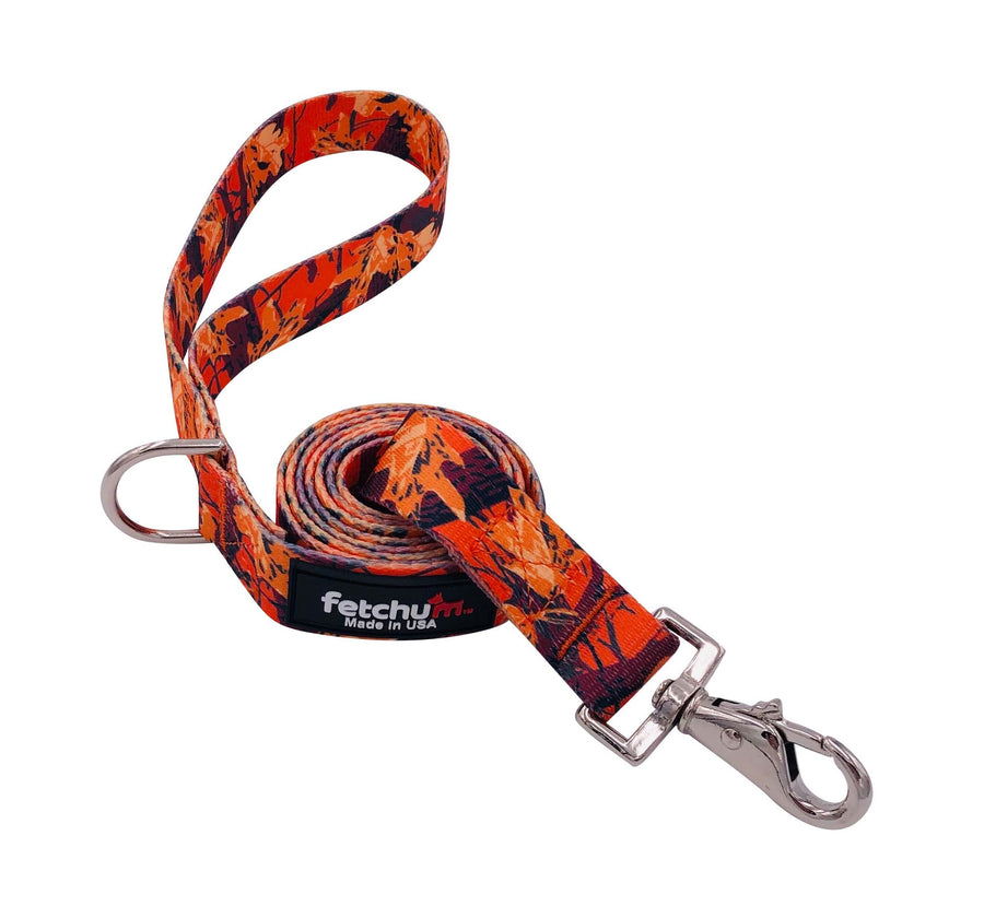 Orange camo leash showcasing vibrant colors, durable material, and swivel snap for easy use, made in the USA.