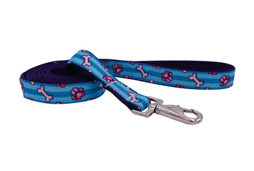 PIXEL PAWS LEASH featuring a colorful design with bones and paw prints, made for strength and style.