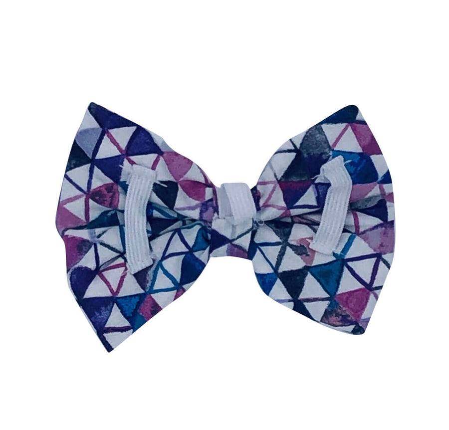 Purple Geo Bow tie featuring colorful geometric patterns on a stylish bow, perfect for dogs on special occasions.