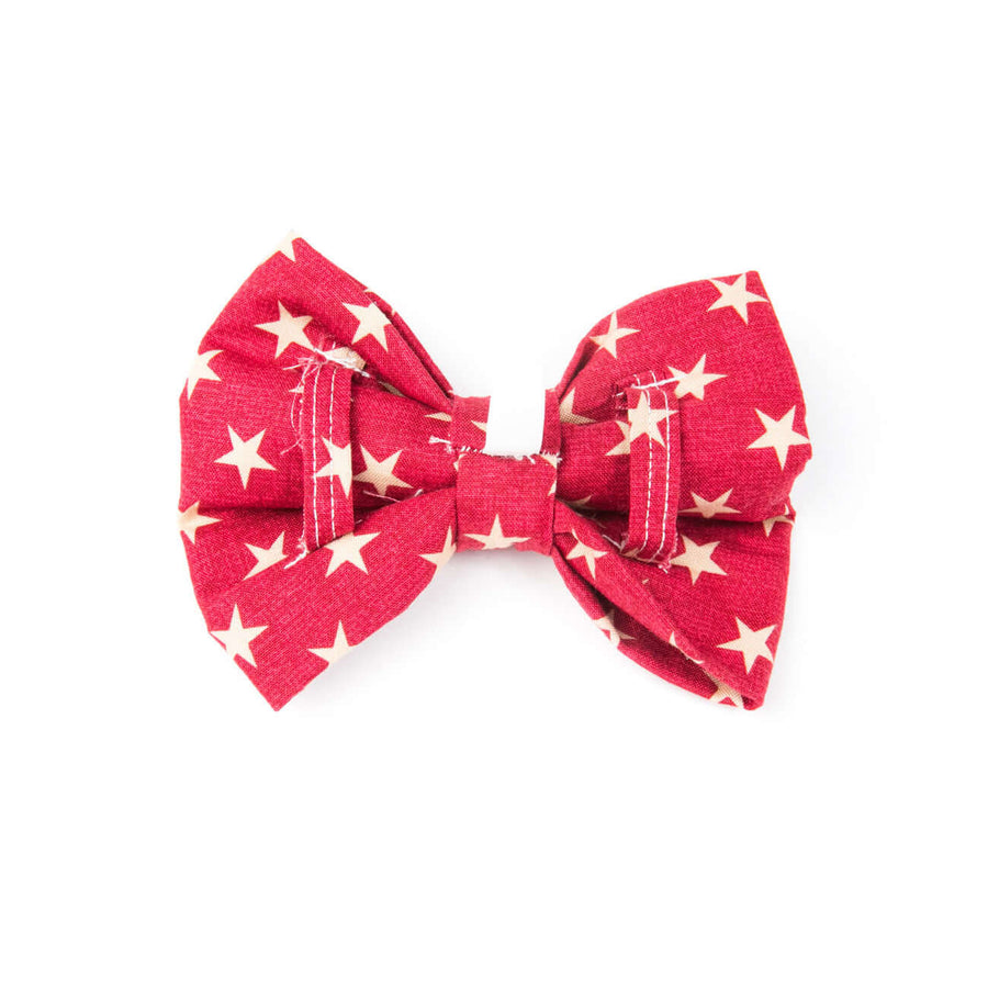 Red Stars Bowtie made of 100% cotton with a unique star pattern, perfect for dogs' special occasions and everyday use.