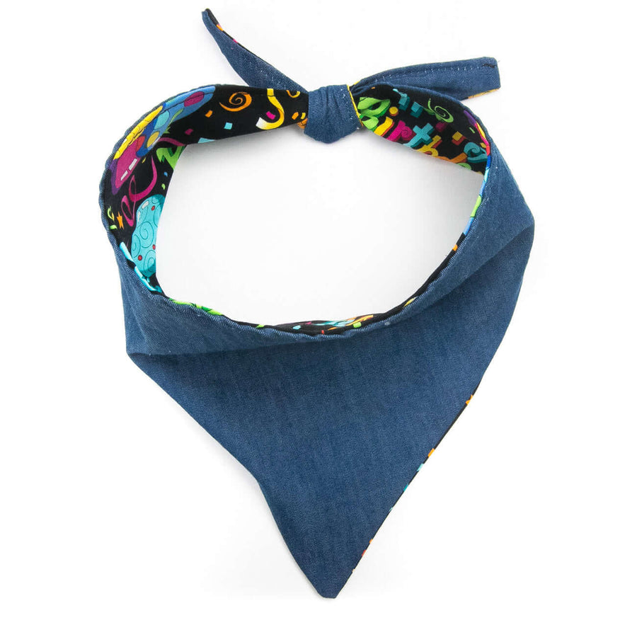 Reversible Happy Birthday Bandana showcasing a colorful design and denim exterior for stylish pet fashion.