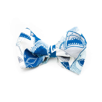 Shark Attack Bowtie featuring fun shark patterns in blue and white fabric, perfect for dogs at special occasions.