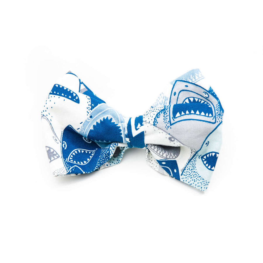 Shark Attack Bowtie featuring fun shark patterns in blue and white fabric, perfect for dogs at special occasions.