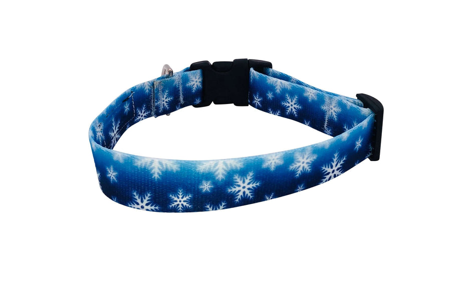 Snowflake Collar featuring a vibrant blue design with white snowflakes, made from durable polyester print webbing.