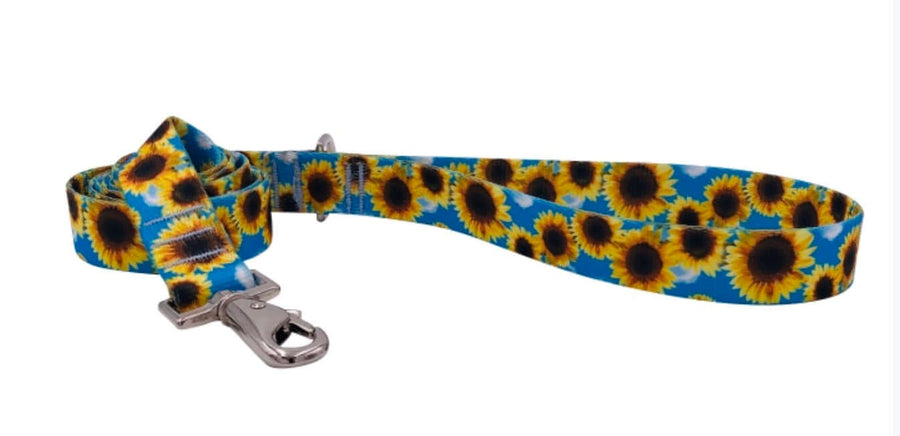 A stylish SUNFLOWER LEASH made of durable polyester webbing, featuring a swivel snap and bright sunflower design.